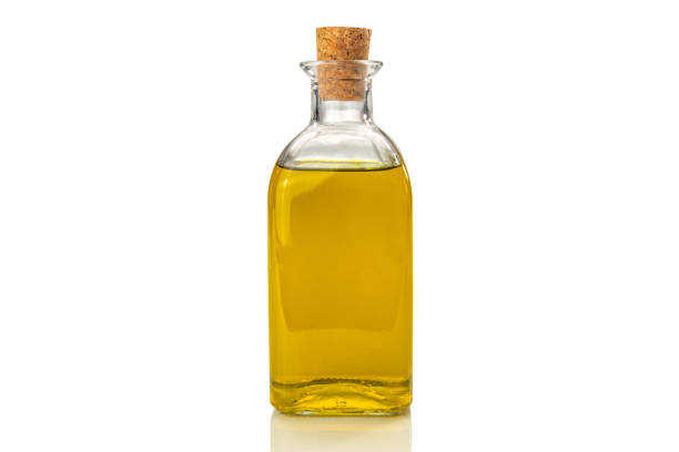 huile d’olive extra vierge en bouteille en verre - cooking oil extra virgin olive oil olive oil bottle photos et images de collection