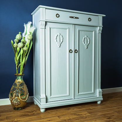 After renovation old wardrobe painted in blue mint color