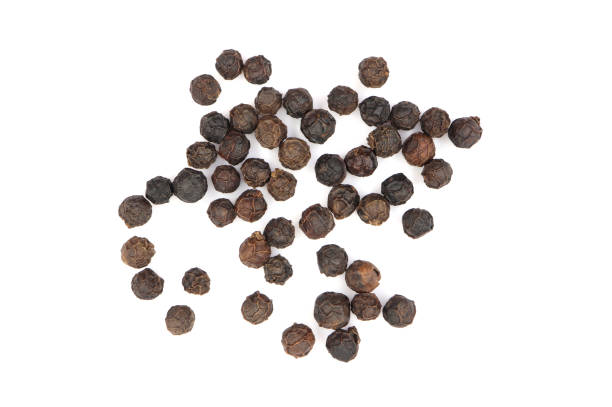 istock pile of black pepper seeds as a spice. 1377685671