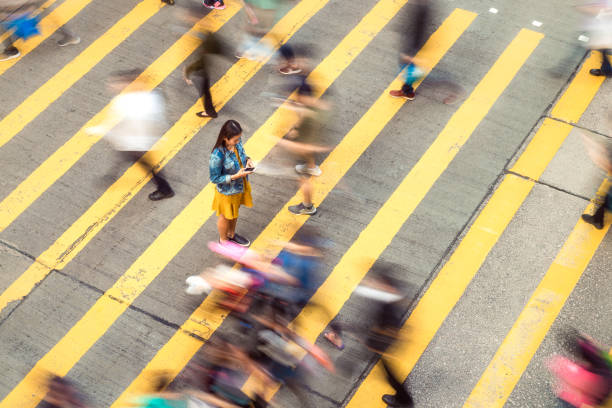 瞬間の時間 - crosswalk crowd activity long exposure ストックフォトと画像