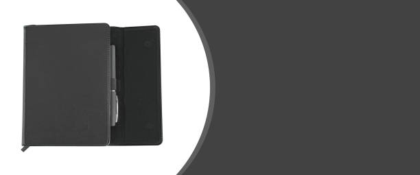 istock a stationery notebook and a pen, on a white background, a place for text, a template for a banner 1377706732