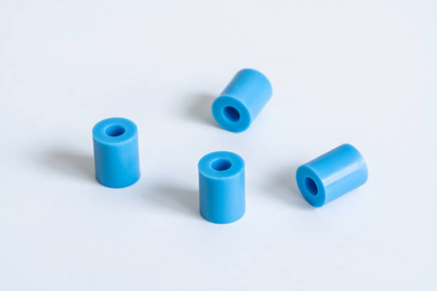Closeup of nuts and washers on white background. connection material.