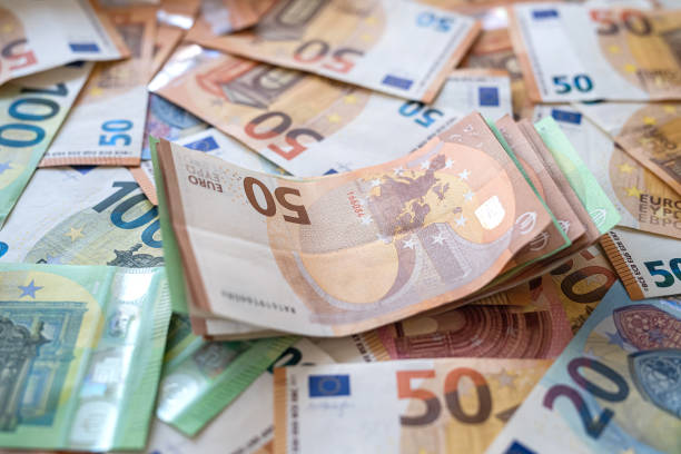 istock Bright euro banknotes, economic 1377745840