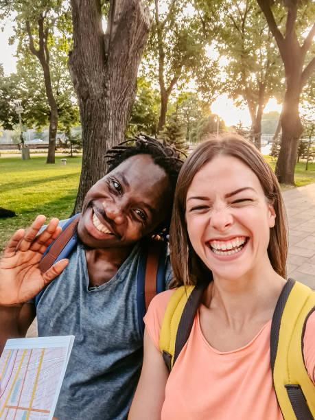 istock Tourist Couple Taking A Selfie 1377746392