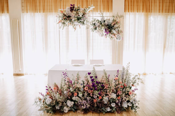 istock Bride and Groom Dining Table Decorated Flowers 1377757084