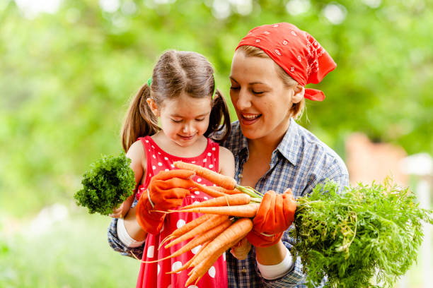 istock Family with fresh vegetable from the garden 1377763171