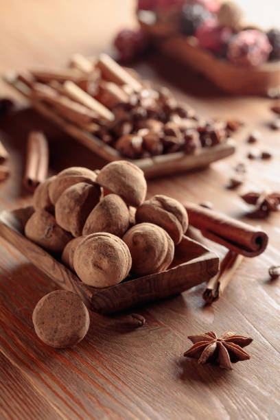 istock Chocolate truffles on a wooden table. 1377764300