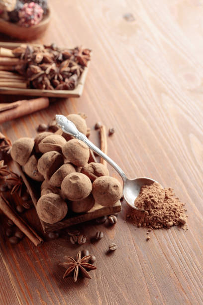 istock Chocolate truffles on a wooden table. 1377764302