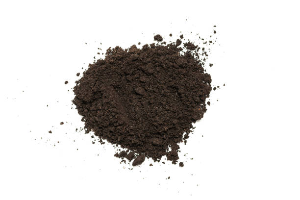 istock Black land for plant isolated on white background. 1377805012
