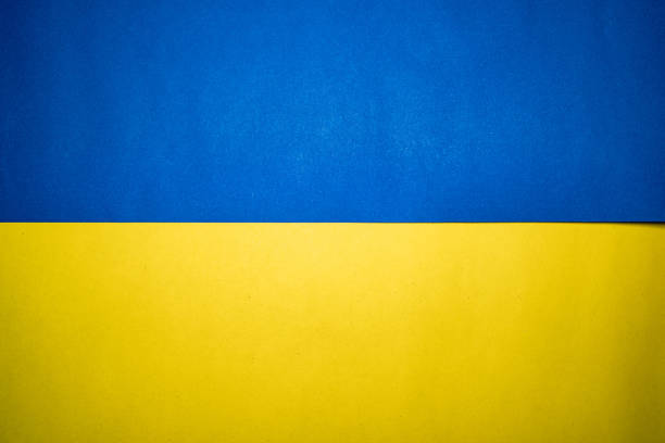 istock Blue and yellow paper texture background 1377805583