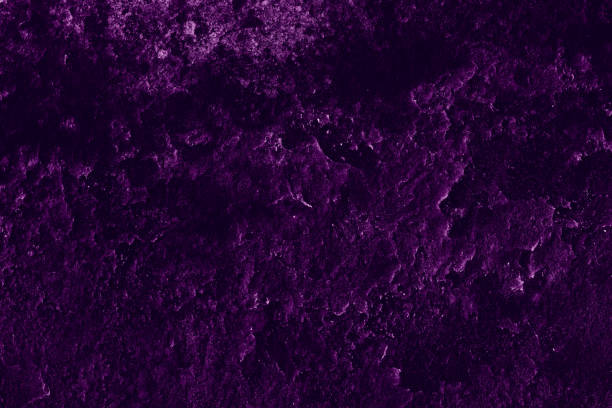 istock Dark purple color rugged surface of old abandoned concrete wall 1377838992