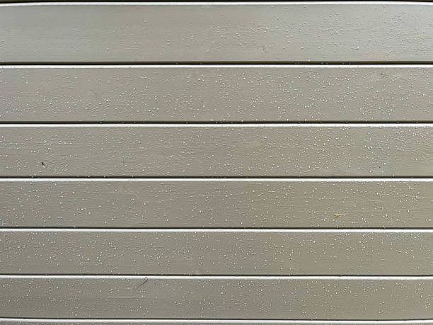 istock Wet light grey lacquered wooden wall. 1377850160