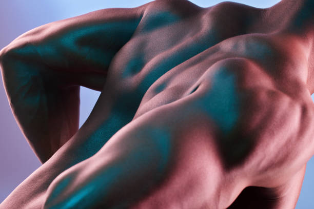 istock Shot of a muscular man posing against a studio background 1377862080