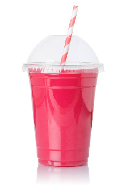 Strawberry smoothie fruit juice straw drink strawberries in a cup isolated on a white background