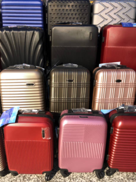 istock Many aluminum and polycarbonate suitcases in a Shopping. 1377902938