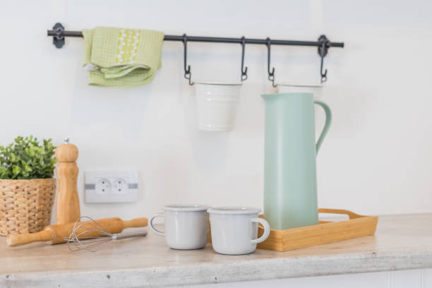 istock Modern kitchen with shelves, food, spice and dishes.kitchen corner with various cooking utensils including plants,wooden utensils ,glass container.loft interior of kitchen in apartment. 1377909932