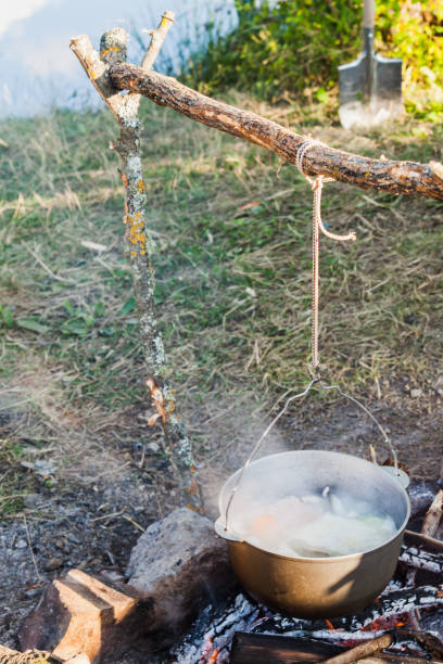 istock Bonfire and hanging cauldron, outdoor food 1377932683
