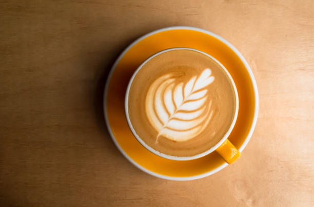 Cup of cappuccino coffee with Rosetta latte art stock photo