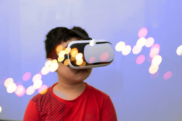 istock kid child use vr video reality for enter cyberspace internet connect to metaverse 1377947357