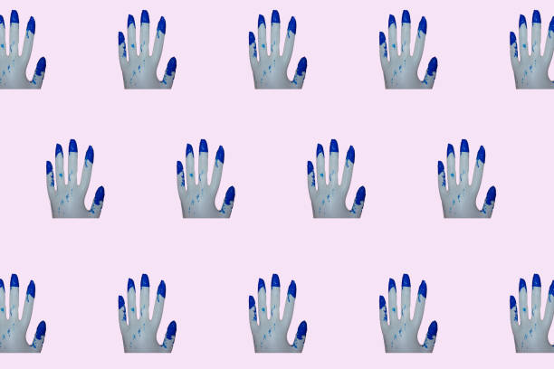 istock white gloves with blue paint on a pastel light pink background copy paste creative 1377983130