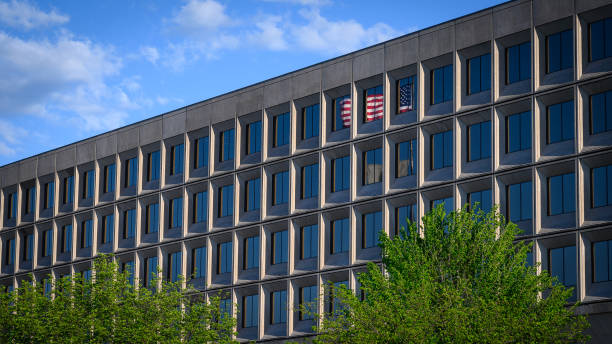 US Department of Energy with Flag Reflection US Department of Energy with Flag Reflection doe photos stock pictures, royalty-free photos & images