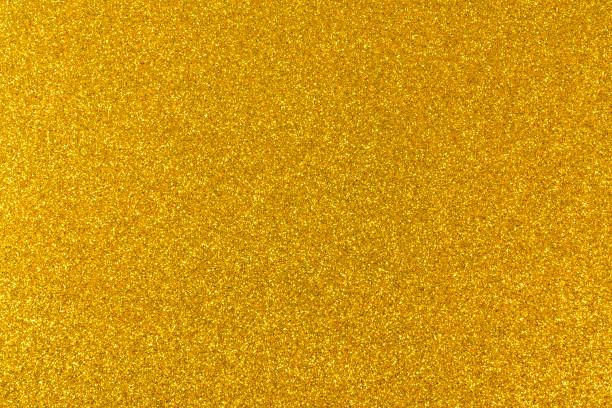 istock gold glitter. yellow glitter paper texture 1378001411