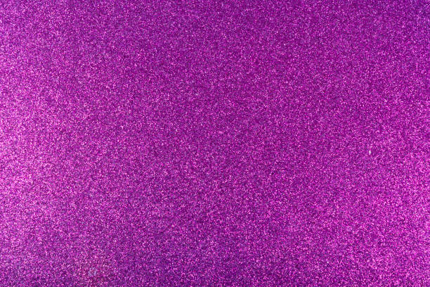 Abstract shiny, radiant texture background with different shades of dark purple color. Painted canvas, glitter concrete surface, studio backdrop, grainy textured effect