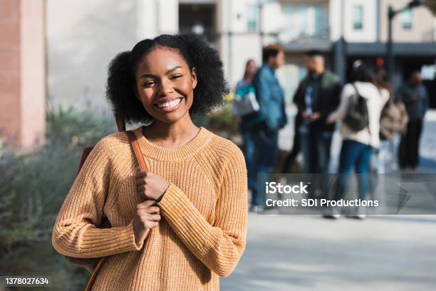 Before Joining Friends On Field Trip Teen Smiles For Camera Stock Photo - Download Image Now