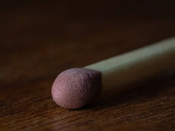 Matchhead in focus, close-up of a matchstick head