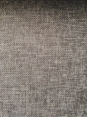 A fine fabric as a texture or background.