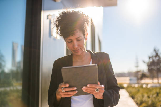 istock A Mature Spanish Businesswoman Using A Digital Tablet 1378051585