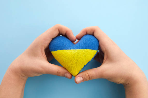 istock Pray for peace Ukraine. Hands with heart. 1378052129