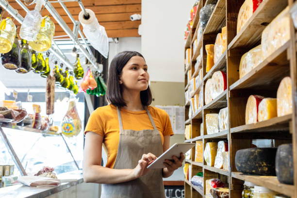 istock Delicatessen store owner taking inventory 1378071005