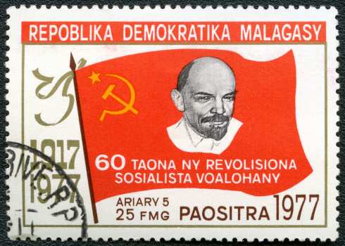 REPUBLICA DEMOCRATICA MALAGASY - CIRCA 1977: A stamp printed in Malagasy (Madagaskar) shows Lenin, devoted 60 years of October revolution, circa 1977