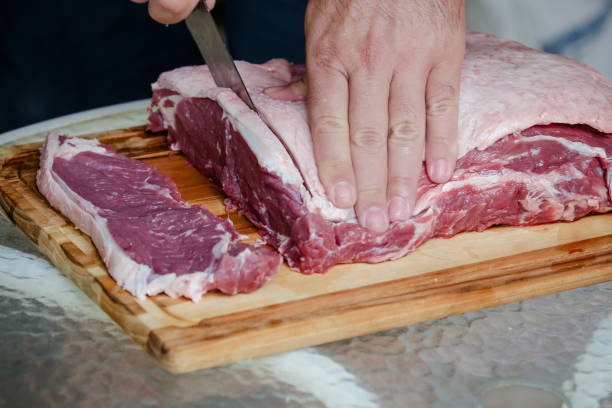 istock Beef cut on the table for barbecue preparation. 1378073635