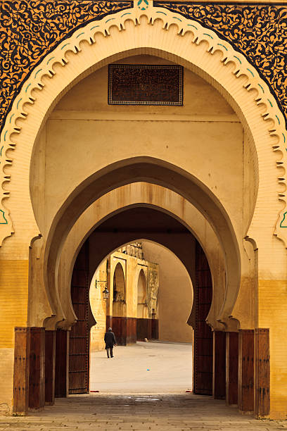 istock Series of Moorish style curving arches in passageway into mosque 137809733