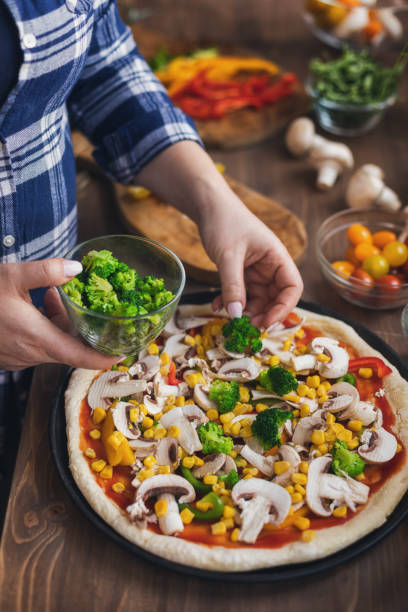 istock Making a Vegetarian Pizza at Home 1378099128