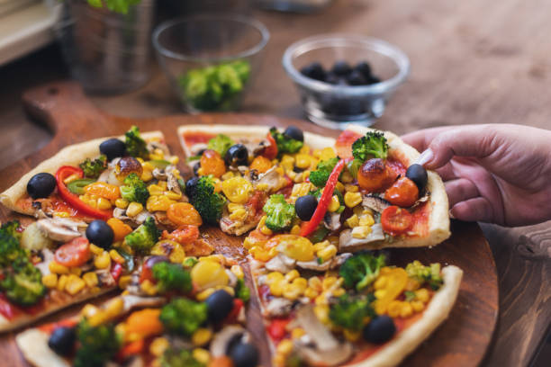 istock Vegetarian Pizza with Broccoli, Cherry Tomato, Pepper and Mushrooms 1378099179