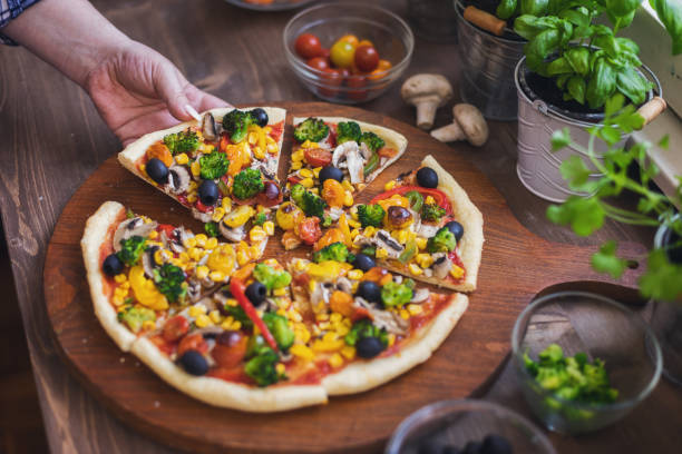 istock Vegetarian Pizza with Broccoli, Cherry Tomato, Pepper and Mushrooms 1378099180