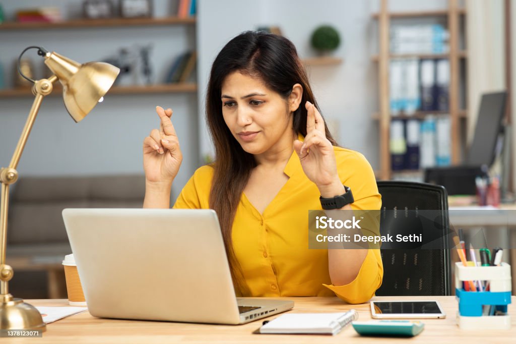 Portrait of a businesswoman working in a modern office, stock photo Portrait of a businesswoman working in a modern office, Desire Stock Photo