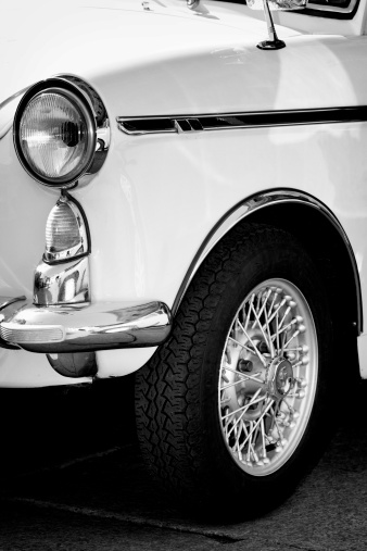 Falcon Heights, MN - June 19, 2022: High perspective front corner view of a 1961 Buick Invicta Sport Sedan at a local car show.