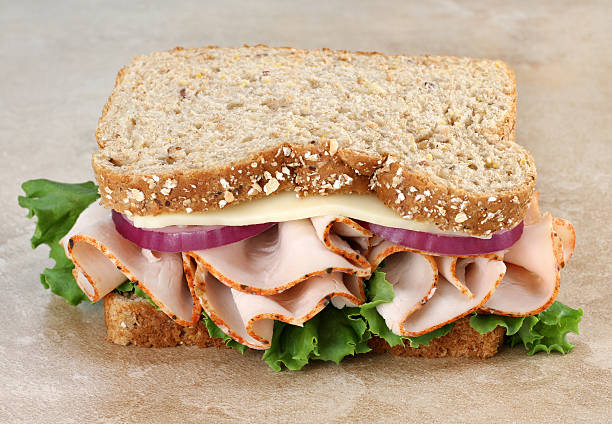 istock Healthy Turkey and Cheese Sandwich on Whole Grain Bread 137813655