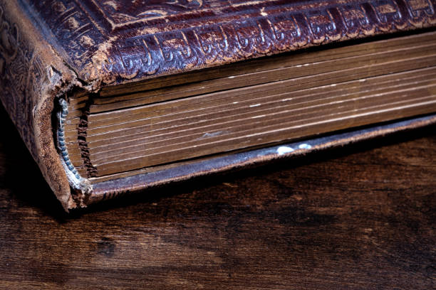 istock closeup of edge of an old torn book 1378140635