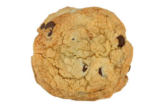 Chocolate chip cookie on a white background with copy space.