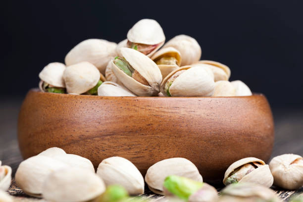 istock delicious fried salted pistachio nuts 1378143889