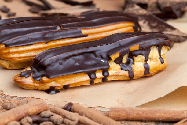 istock chocolate-covered custard eclair with creamy chocolate cream 1378144435