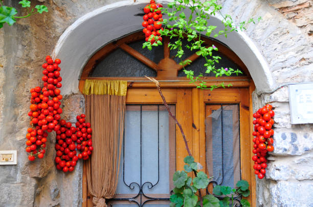 tomatoes outside a stony house in mesta village chios greece