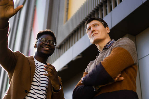 istock Two Casual businessmen talking outside 1378180822