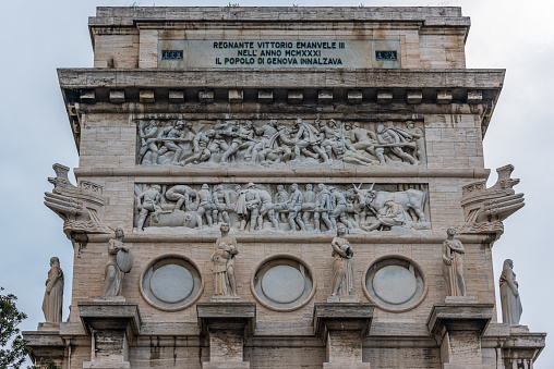 Statues decorating the trimphal Arch of the Victory Square in Genoa, Italy