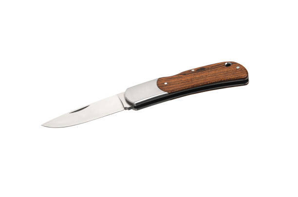 istock Compact metal sharp knife with a folding blade. Pocket folding knife with wooden handle isolate on white background. 1378218298